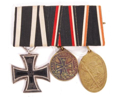 A WWI First World War German Imperial army medal bar of three awards to include 1813-1914 iron cross 2nd Class, Kyffhauser 19