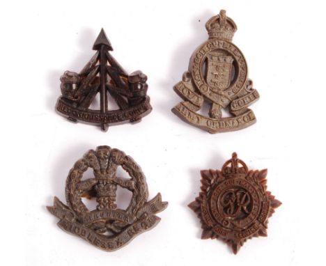 A good collection of x4 original WWII Second World War plastic / Bakelite ' Economy ' uniform cap badges. Includes a rare Rec