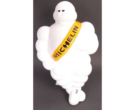 An original vintage Michelin Tyres light-up advertising mascot. Plastic construction, with a yellow and black painted Micheli