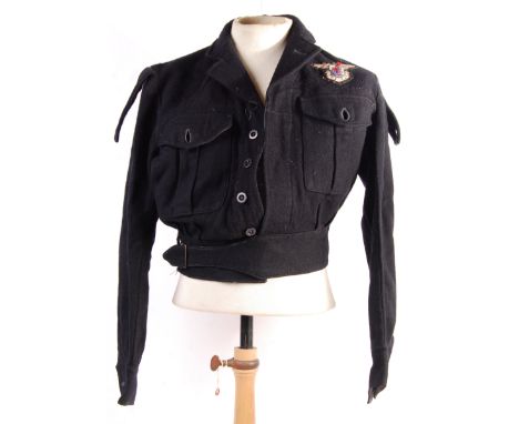 A rare original WWII Second World War FAFL Free French Air Force pilot's / crew members tunic. The dark-blue tunic / battledr