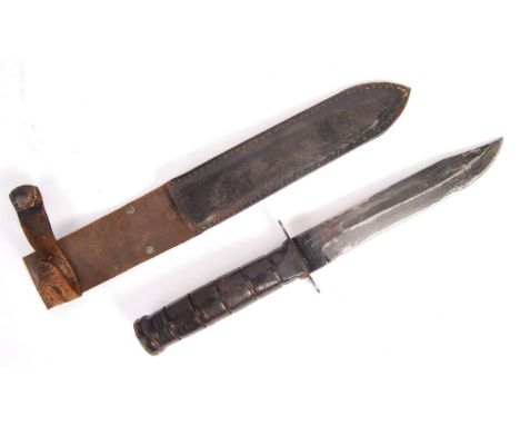 An original WWII Second World War Special Forces fighting / combat knife. Steel blade, with turned wooden handle. No makers m