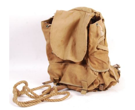 A rare original WWII Second World War named backpack, used during the D-Day landings in Normandy. Named to a 3195450 Private 