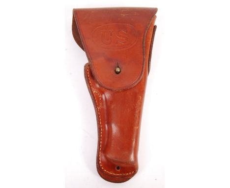 A Post WWI First World War United State Us Army M1916 Brown leather gun holster with brass fastener to the flap and fixed bel