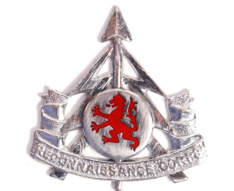 A scarce original WWII Second World War era Scottish Reconnaissance Corps uniform cap badge. Usual Reconnaissance Corps form,