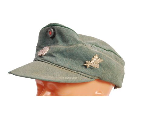 A rare original WWII Second World War Nazi Third Reich German Waffen SS Sniper's cloth cap. Complete with Totenkopf / Death's