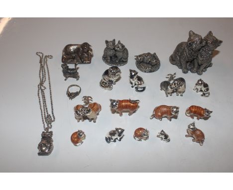 A collection of silver and enamel cat ornaments and others 