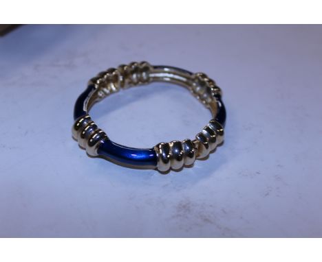 A Donald Stannard bracelet, gold tone and blue enamel