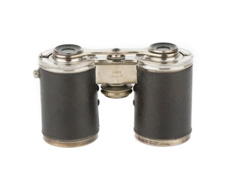 Levy's Patent Opera Glasses or Compact Binoculars, French, C.1912-20, in nickel plate with leather barrels, with compass, mar