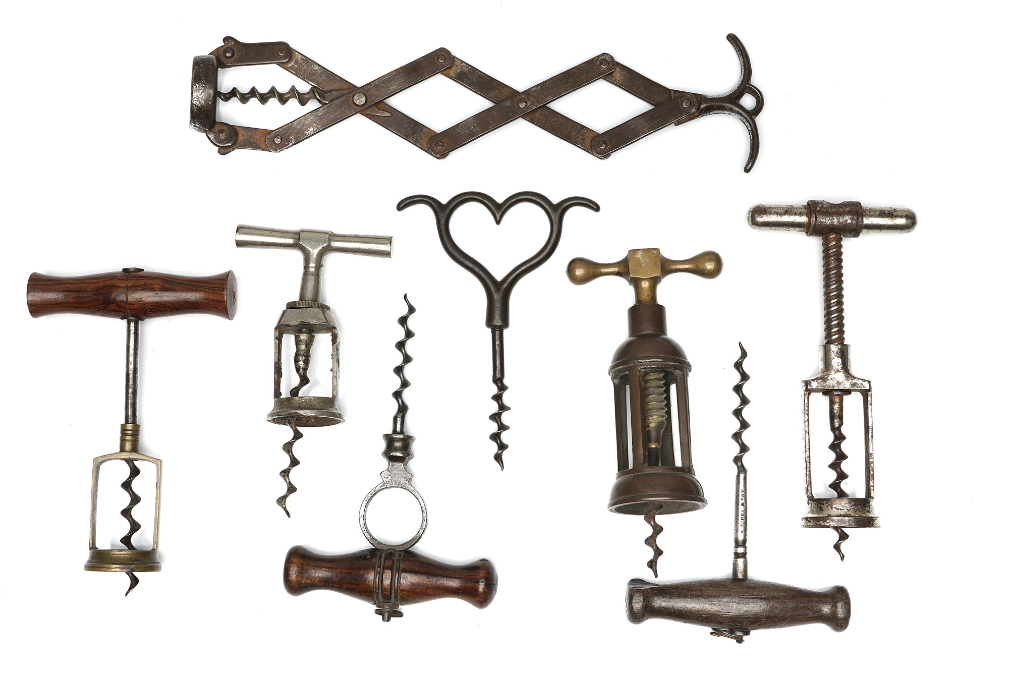 A Collection of Corkscrews, a mixed lot of eight simple and mechanical ...