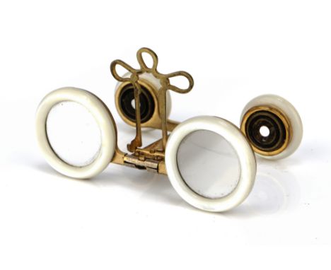 A Pair of Jumelles Mars Folding Opera Glasses, in gilt brass and mother-of-pearl, stamped 'Jumelles Mars Btee. France Etrange