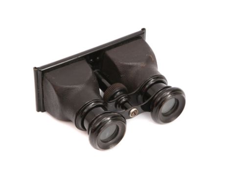A Small Hand Held Stereo Viewer, c.1900, unsigned finished in black leather and black enamel with screw focus