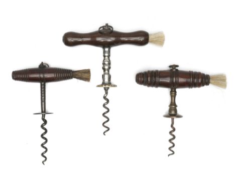 Three Henshall-type Concave Button Corkscrews, one with steel shank and decorative brass button, one with brass shank and but