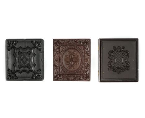 Three Union Cases with Ambrotypes, one by Holmes, Booth &amp; Hayden, with geometric scrolls, c.1860, 8.5cm x 9.5cm sixth-pla