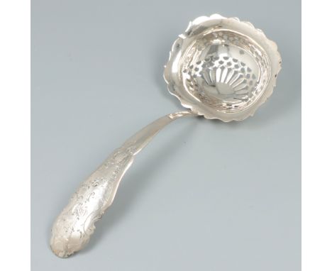 Sifter spoon silver. Openwork bowl with scalloped rim. The handle with engraved Biedermeier decoration. The Netherlands, Scho