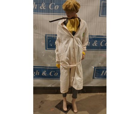 Life size mannequin in BP and other motoring uniform