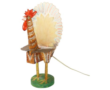 Gerard Rigot (b.1929), France, a hand carved wooden Cockeral lamp with perspex tail fan and metal wings, signed to base, heig