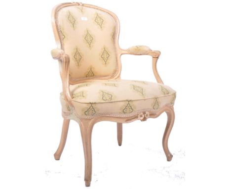 An antique 18th Century Georgian George III English painted Hepplewhite armchair fauteuil arm chair having a carved floral to