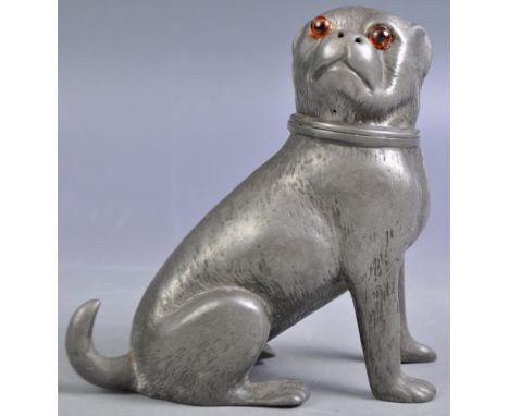 An antique 19th Century Victorian English pewter sander / pounce pot / pepperette salt shaker in the form of a dog. The dog i