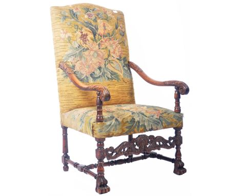 A large and impressive antique 18th Century French walnut tapestry armorial throne armchair / arm chair having a green ground