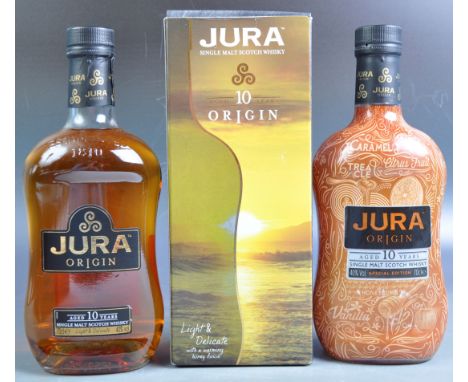 Two bottles of Jura Origin Ages 10 Years Single Malt Scotch Whisky comprising a boxed example and a Special Edition. 70cl 40%