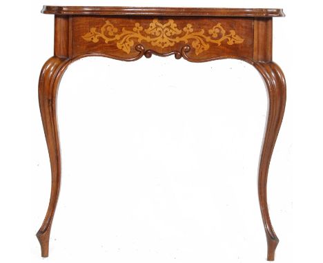 An antique 19th Century Dutch walnut and satin wood console hall side occasional table having a serpentine chamfered edge top