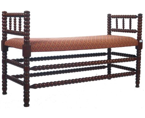 An antique 19th Century Victorian William &amp; Mary Revival mahogany bobbin window seat / duet piano stool of elongated rect