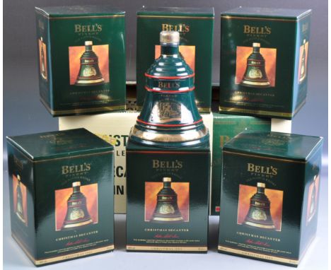 An impressive set of six Arthur Bell &amp; Sons&nbsp; Bells / Bell's Finest Scotch Whisky Christmas Decanter 1993 porcelain d