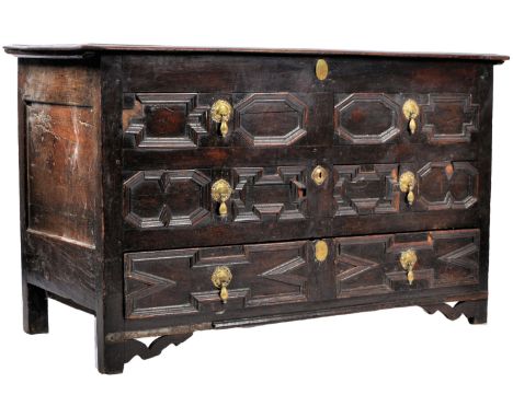 An antique 17th Century oak block fronted mule chest coffer box having great geometric moulded block front with faux drawers 