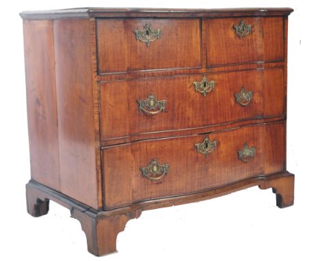 An antique 18th Century Dutch Continental serpentine fronted walnut chest of drawers of great proportions. The bank of two ov