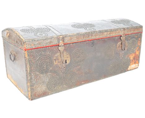 A 17th Century Spanish antique colonial leather ships trunk chest of slight domed form having leather clad bodie with studded