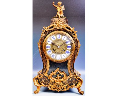 A striking antique 19th Century French Boullework Boulle Work table mantel bracket clock having intricate brass inlay scroll 