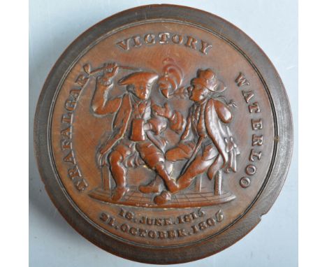 A rare early 19th Century Battle Of Trafalgar / Waterloo Commemorative pressed treen snuff box of circular for by Obadiah Wes