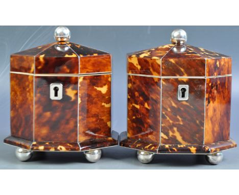 A fantastic pair of antique 19th Century blonde tortoiseshell tea caddies caddy of octagonal form having silver plated ball f