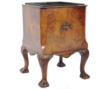 An antique 19th Century Georgian walnut wine bucket / champagne ice bucket having a canted square body with inset metal tray 