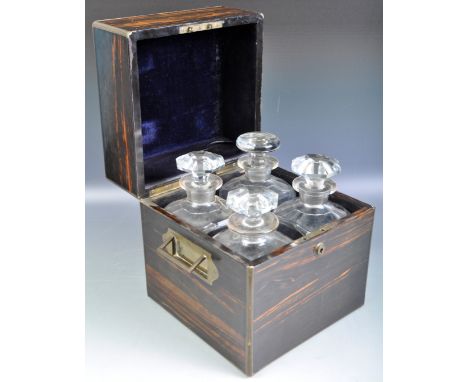 A superb antique 19th Century coromandel veneered&nbsp;and brass bound&nbsp;liqueurs box tantalus having brass bound borders 