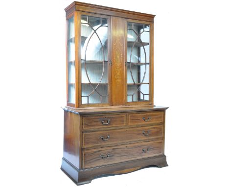 A large and impressive antique 19th Century Georgian English mahogany display bookcase cabinet on a chest of drawers base. Th