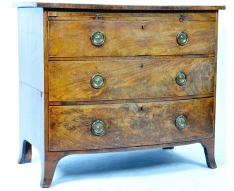 A good antique early 19th Century Georgian English bow fronted bachelors attic chest of drawers of mahogany construction. Cro