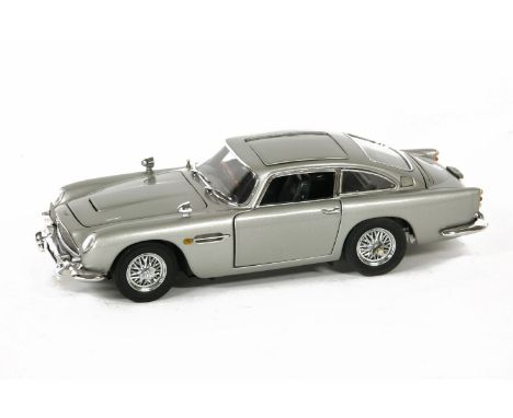 A Danbury Mint diecast model of James Bond 007 Aston Martin DB5, in metallic silver body