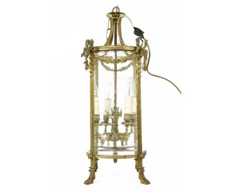A gilt four light hanging hall lantern