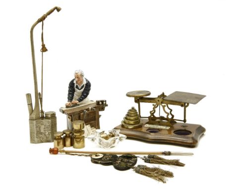 A pair of Victorian/Edwardian letter scales and weights, a modern Chinese opium pipe and a Royal Doulton figure, 'The Carpent