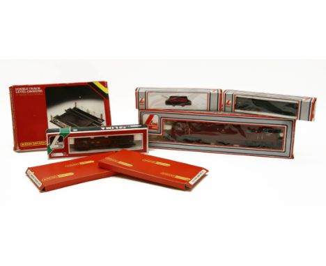 Three boxes of Dublo electric railway items, by Hornby and Lima, including Locos, Rolling Stock, and track