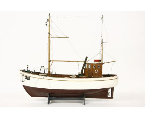 A scratch built model of a fishing boat, E714, with hand painted detail and separate stand, total height 48 cm
