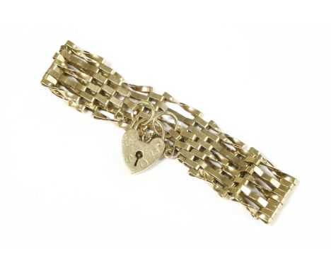 A 9ct gold five row gate link bracelet with padlock,11.31g
