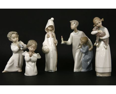 Five Lladro figures, including two angels, a young girl with a lamb, etc