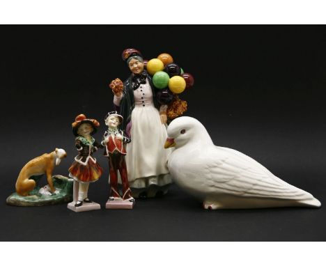 A collection of decorative ceramic ornaments, to include Royal Doulton, Pearly Boy & Girl, The Balloon Seller, a Capodimonte 