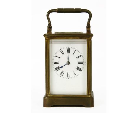 A French brass carriage clock, in fitted travelling case