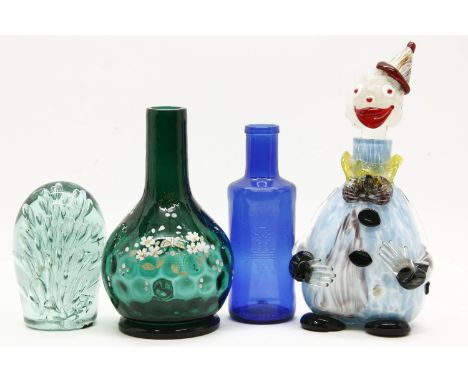 A collection of glassware, to include a large green glass dump paperweight, a Murano glass clown decanter, Caithness glass pa