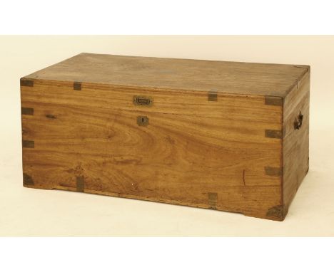 A camphorwood trunk, with metal corners and carrying handles.  The interior with label 'made in China, Canton Hop Wo'