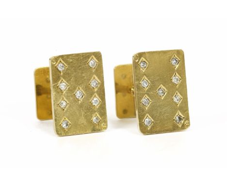 A pair of gold cufflinks, in the form of playing cards, nine of diamonds to the front, grain set brilliant cut diamonds to a 