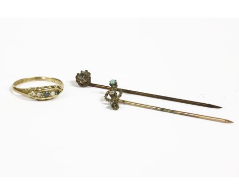 An 18ct gold sapphire and diamond boat shaped ring (one stone deficient), a gold diamond and turquoise stick pin (one stone d